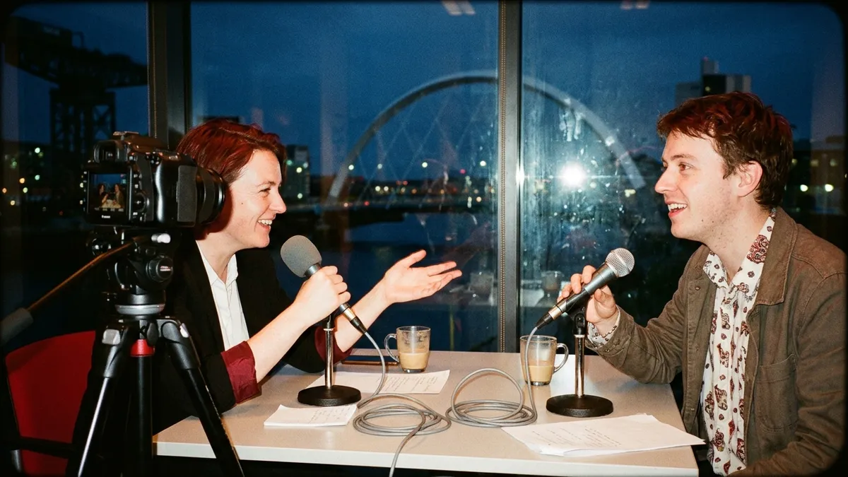 Illustration of a video podcast recording session in a Glasgow studio, with two hosts at a table, studio lights and a camera in the foreground.